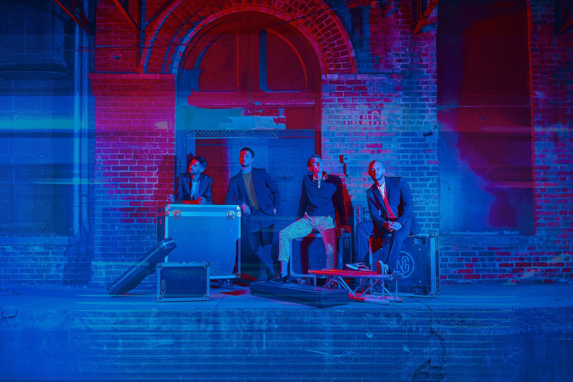 Neon Transit on a train platform | Elegant Music Group